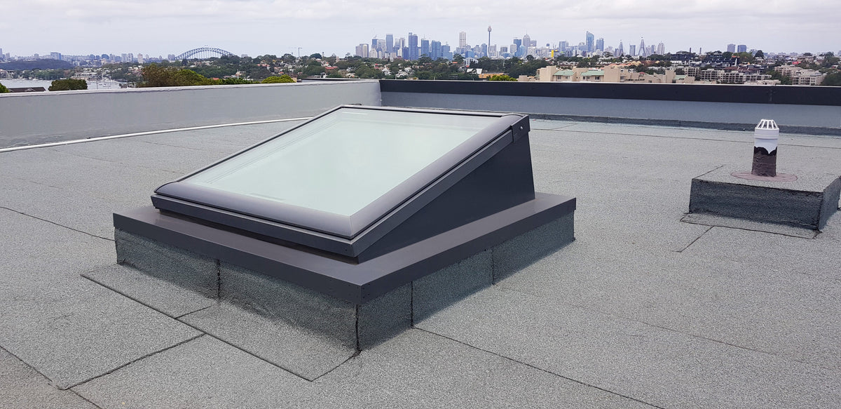 Why You Should Always Pitch a Skylight — Even on a 'Flat' Roof